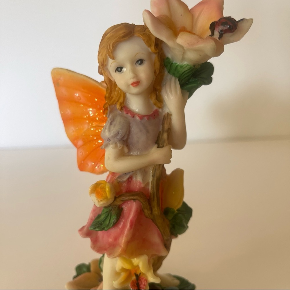 Fairy Figurine with Orange Wings and Pink Dress